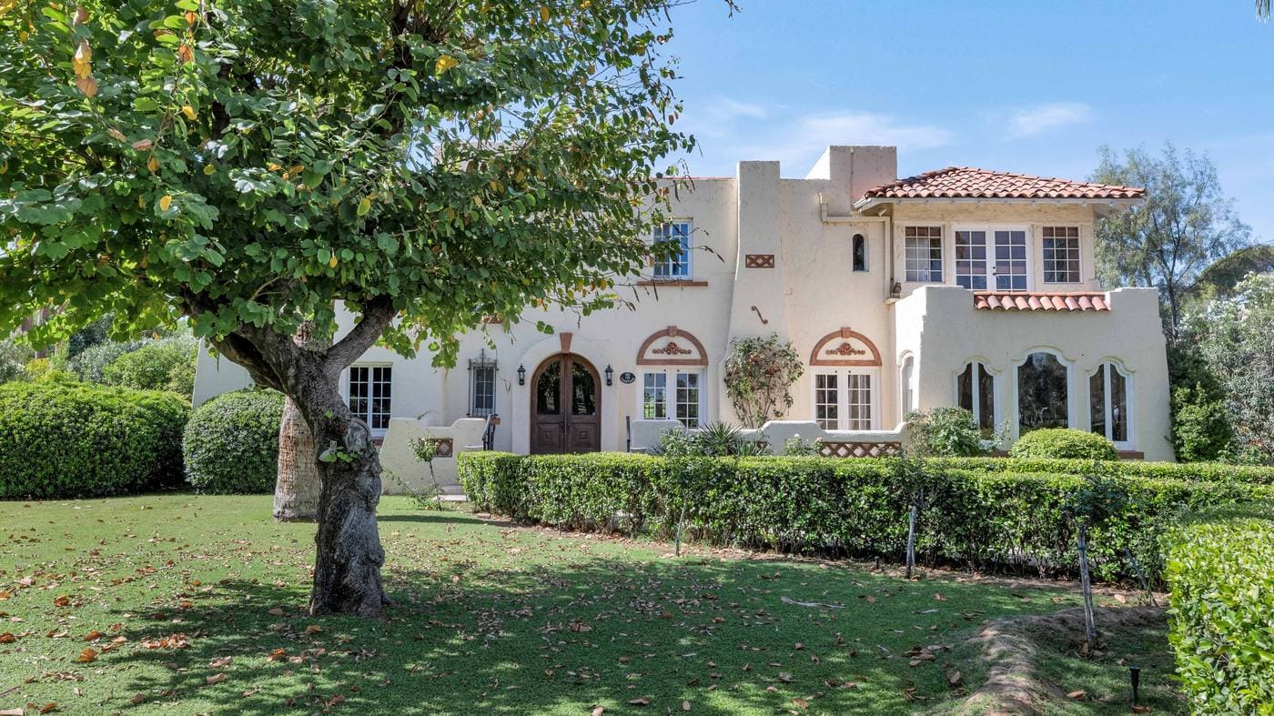 161 E Country Club Drive Phoenix — rear grounds with pool, balcony and lush landscaping